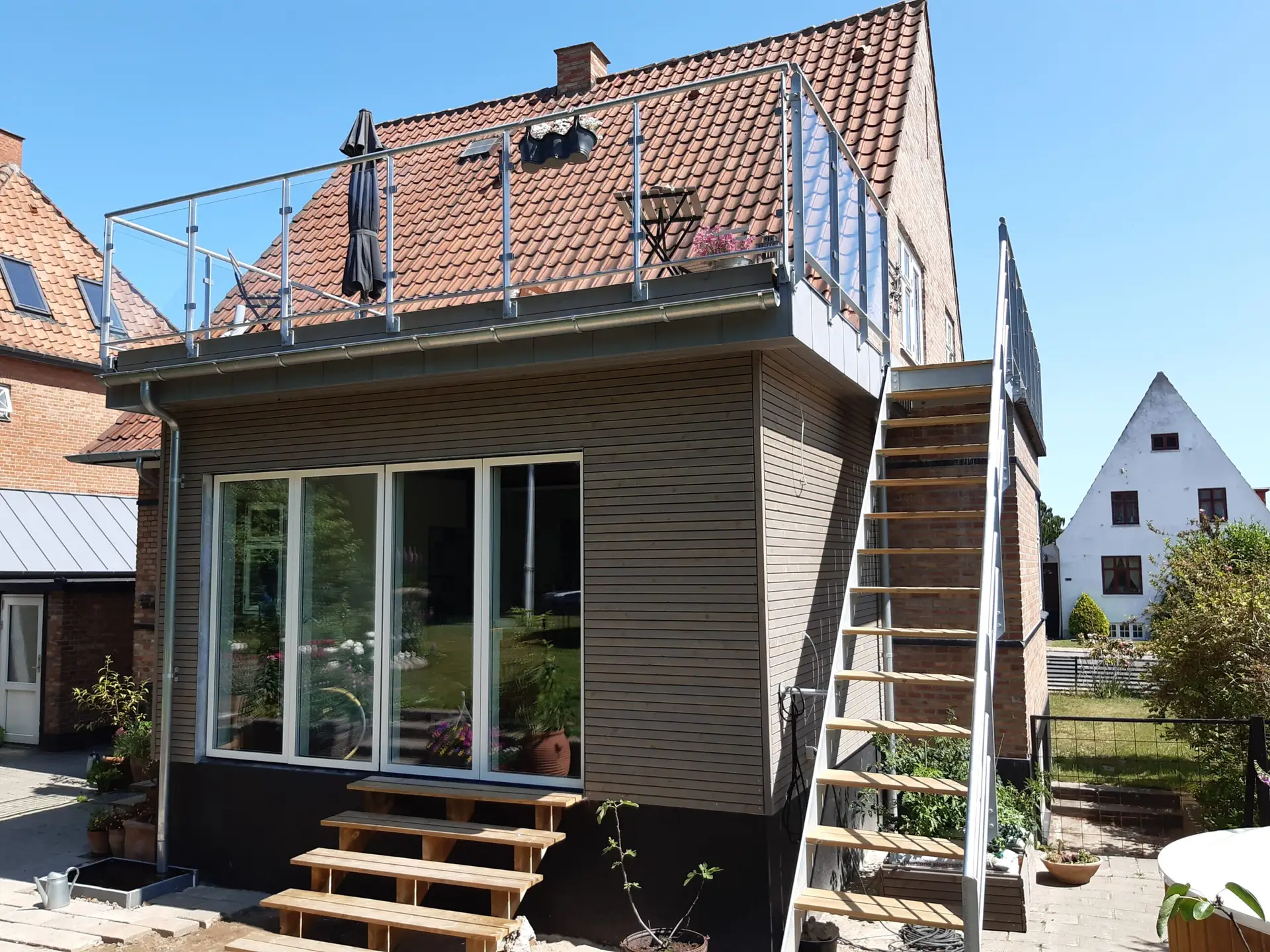 Eksklusiv tagterrasse med glasværn i Odense - Totalentreprise udført af Bakmann ApS"